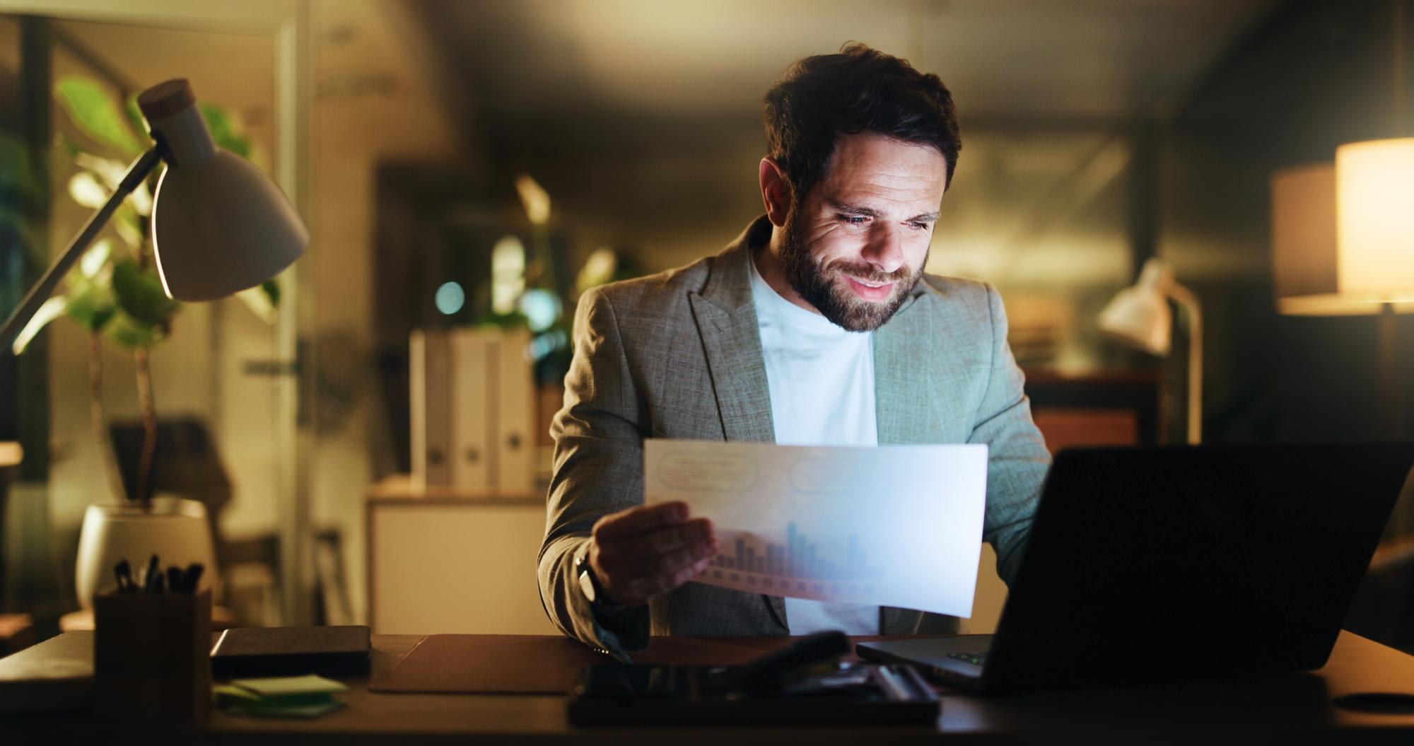 selling business - Laptop planning and documents with business man in office for night account grap