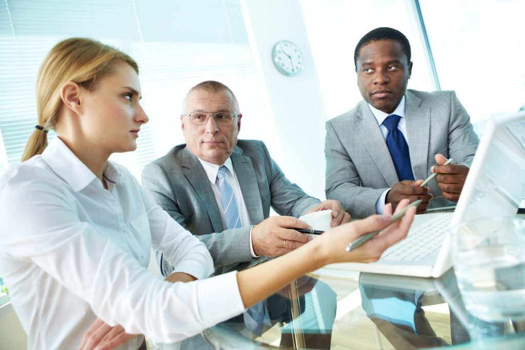business merger integration strategy meeting corporate professionals